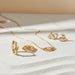Aretes Colgantes con Diseño de Cono 4D Color Dorado | Grado B