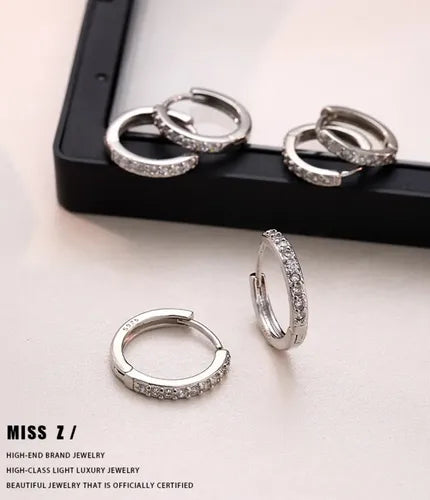 ARETES Y ANILLO MÖBIUS ETERNO COLOR PLATEADO PREMIUM