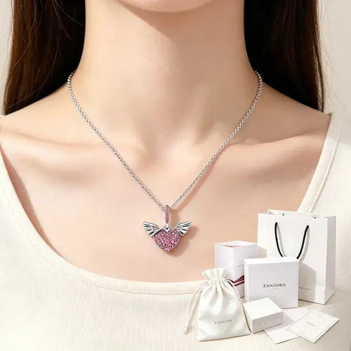 COLLAR CORAZÓN Y ALAS DE ÁNGEL ROSA COLOR PLATEADO 2